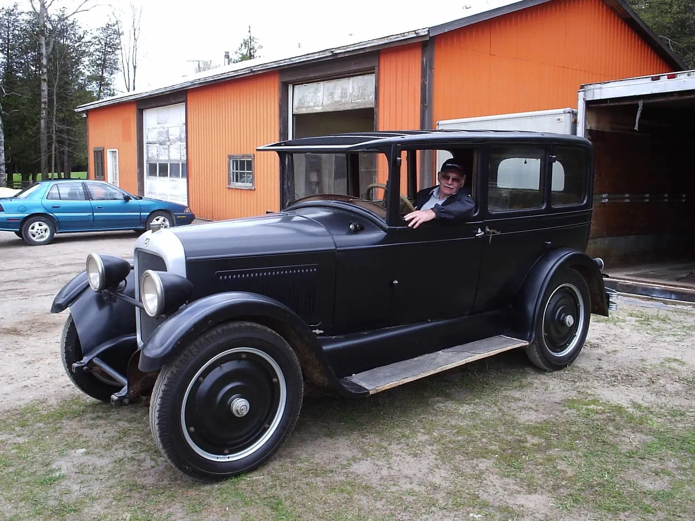 Harley in his 1927 Studebaker Big Six during a Chapter visit to their farm in Sunderland